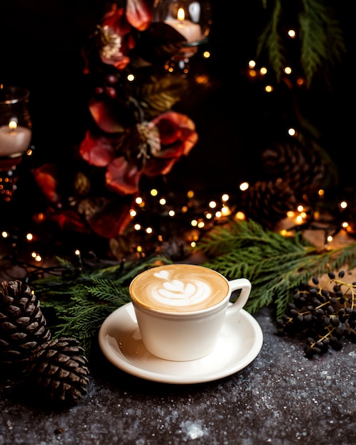 A glass of cappuccino on the table