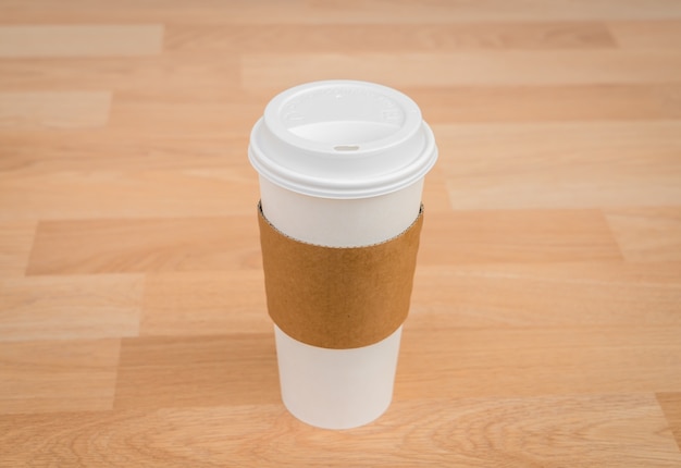 Glass of coffee on a wooden table