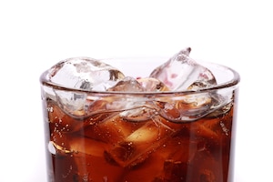 Glass of coke with ice cubes