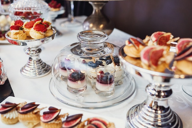 Glass cover hides blueberry desserts