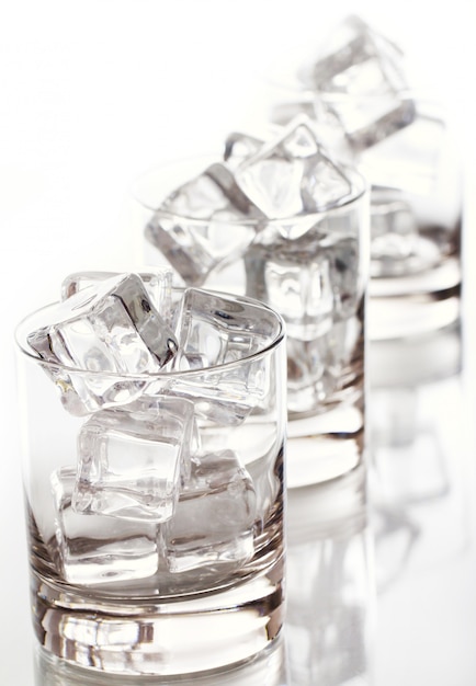 Glass filled with ice cubes