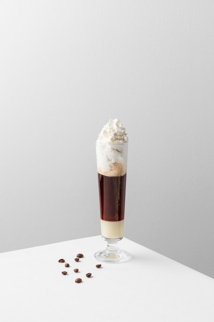 Glass of frappucino on table