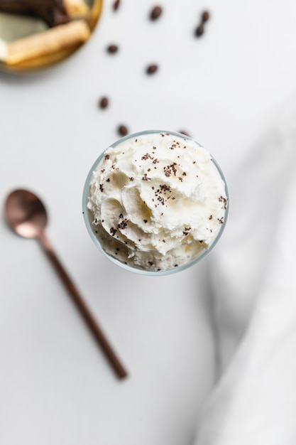 Glass of frappucino on table