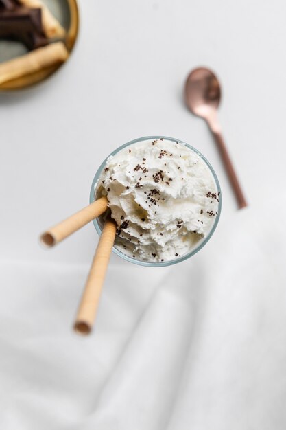 Glass of frappucino on table