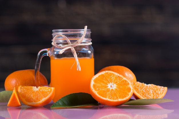 glass of fresh orange juice with orange slice