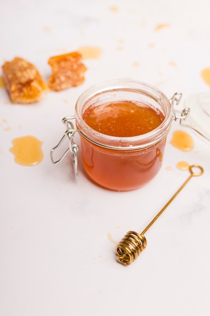 Glass jar full of honey