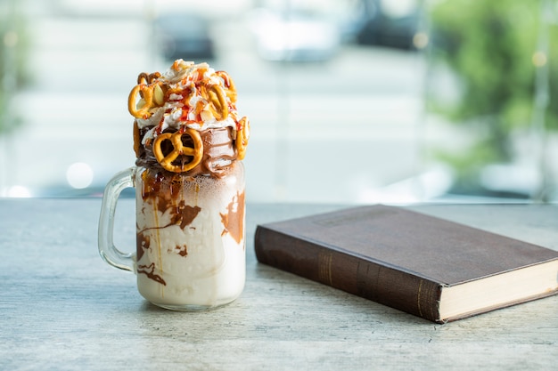 A glass jar of milky chocolate cocktail