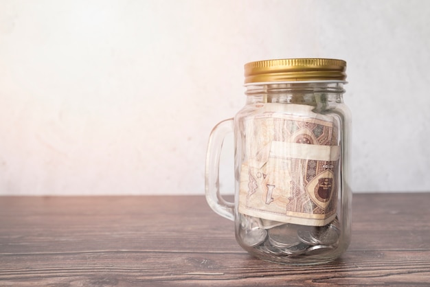 Glass jar for savings