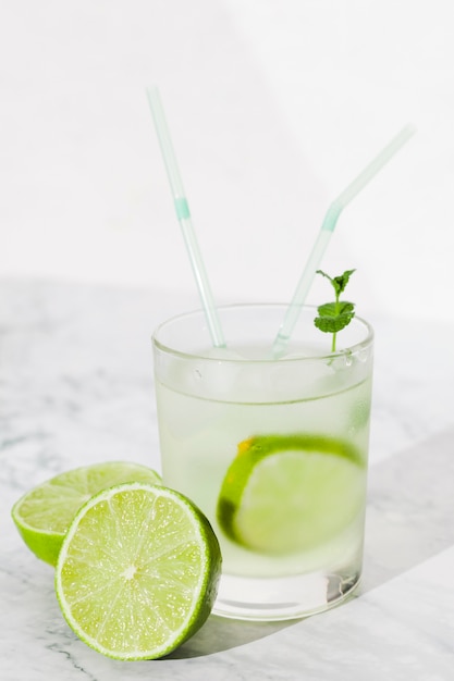 Free photo glass of lime drink on table
