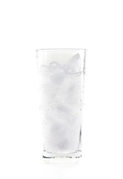 Glass of mineral carbonated water with ice