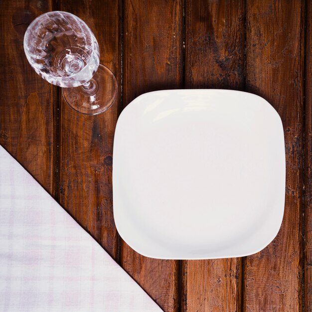  Glass and plate on old wood