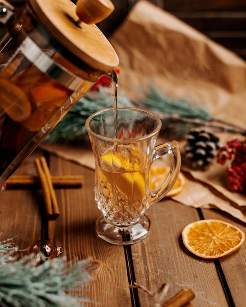 Free photo glass of tea with lemon on the table