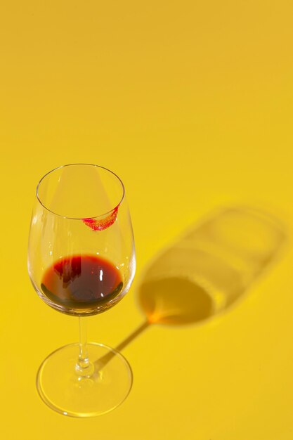 Glass of wine with lipstick stain