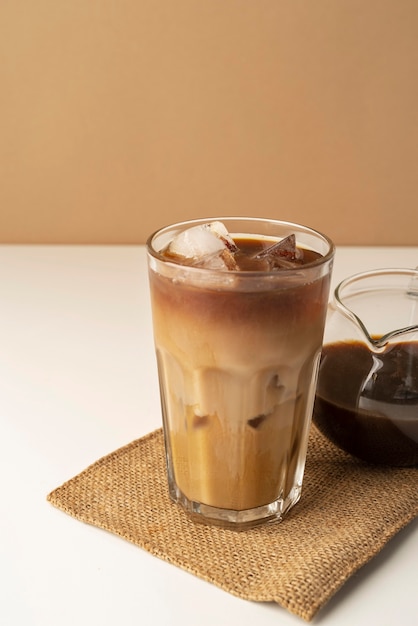 Free photo glass with iced coffee on table