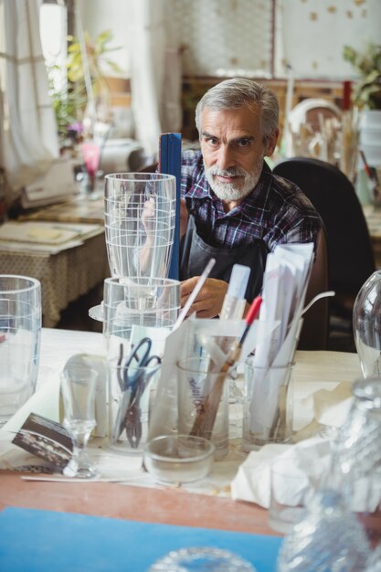 Glassblower working on a glassware