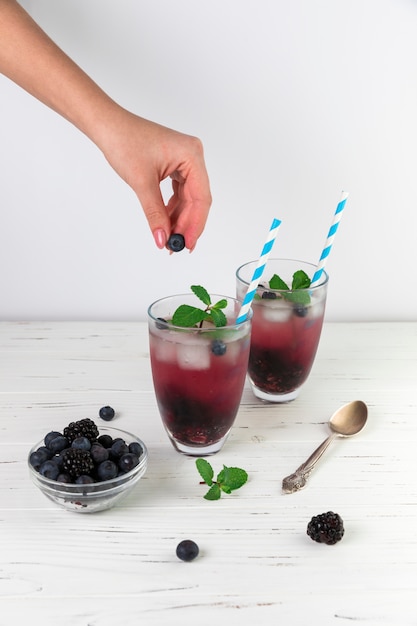 Glasses of fresh iced wild berries