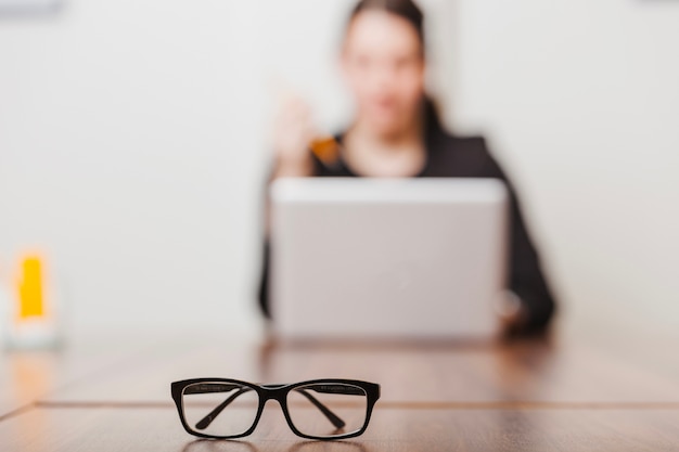 glasses of office working woman