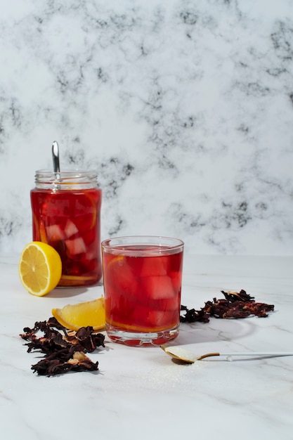 Free photo glasses of refreshing hibiscus ice tea