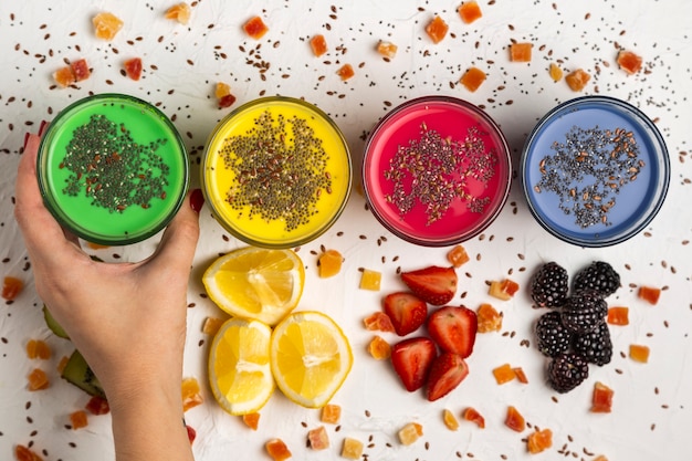 Free photo glasses with colorful smoothies