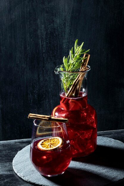 Free photo glasses with fruity drinks on table