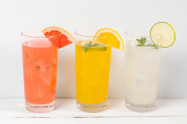 Glasses with fruity drinks