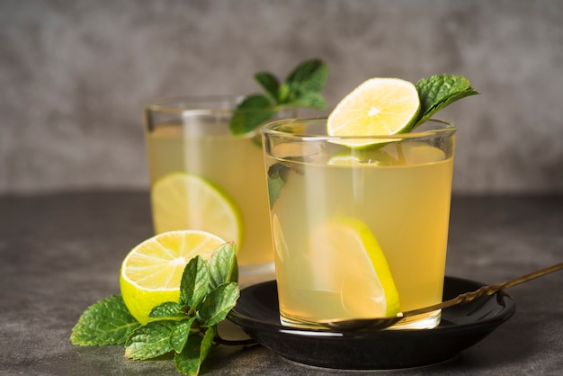 Glasses with lemonade on table