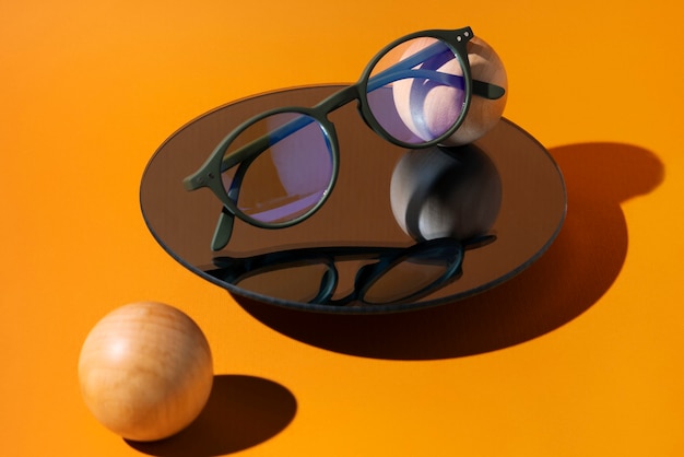 Free photo glasses with rounded frames still life