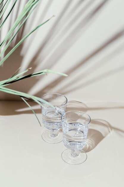 Glasses with water on table