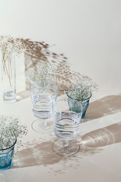 Glasses with water on table