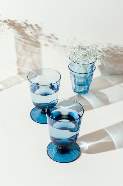 Glasses with water on table