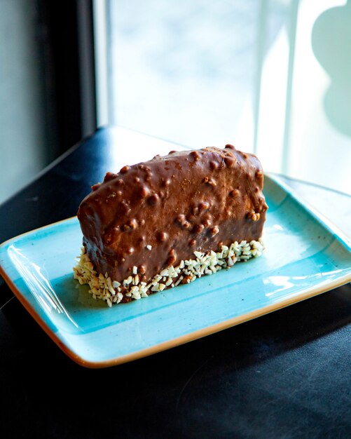 glazed chocolate brownie with crispy nuts