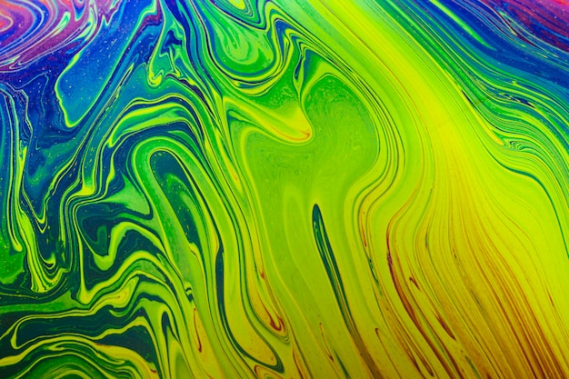 Gleaming wavy green and blue abstract background