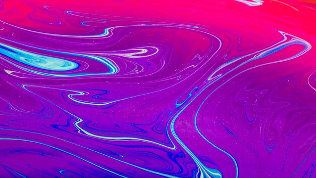 Gleaming wavy pink and purple abstract background