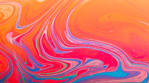 Gleaming wavy red and orange abstract background