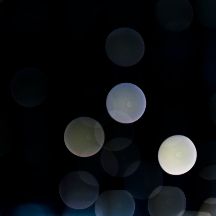 Free Photo glitter bokeh dark background