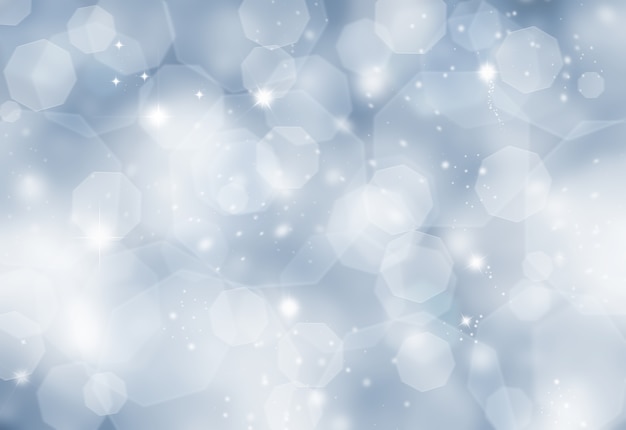 ボケ味の光の効果を持つキラキラの青いクリスマスの背景