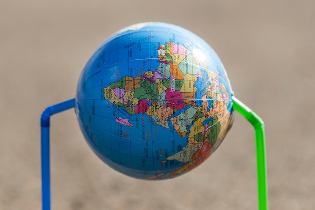 Globe with plastic straws