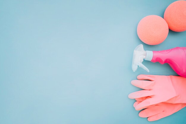 Gloves and spray bottle with space on left