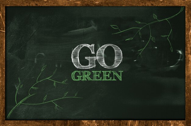 Go Green Text on blackboard