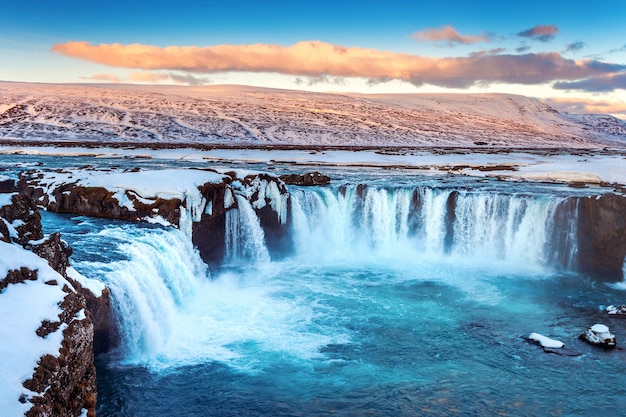 Godafoss waterfall at sunset in winter, Iceland.