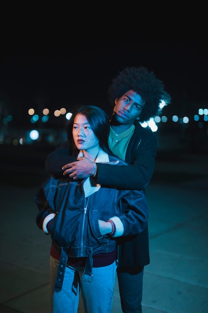 Free photo going out concept with couple at night