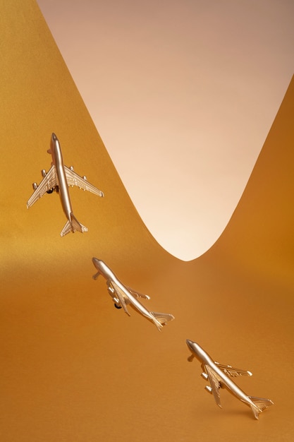 Free photo gold aesthetic wallpaper with  planes