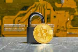 Free photo gold bitcoin and padlock