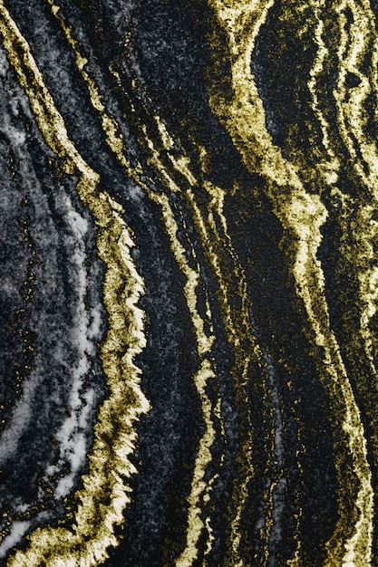 Gold and black layered marble textured background