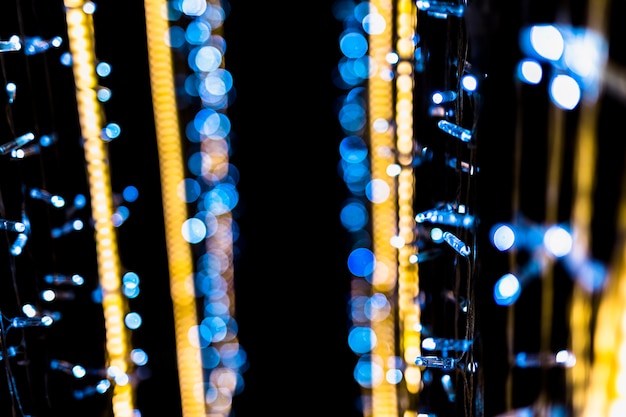 Gold and blue abstract bokeh black background