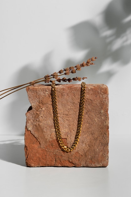 Free photo gold chain and brick arrangement