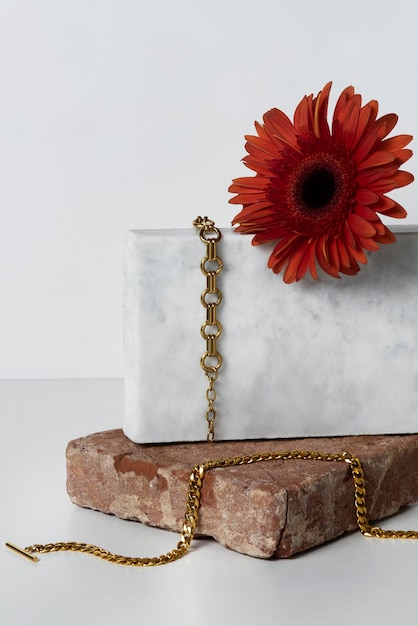 Free photo gold chains and flower arrangement