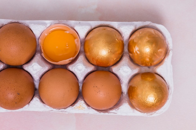 Gold Easter eggs in rack 