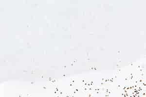 Free photo gold glitter on abstract white background