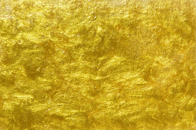Free Photo gold painted textured wall background